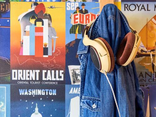 a pair of headphones hanging from a pair of jeans at hotelF1 Mulhouse Centre Ouest in Mulhouse