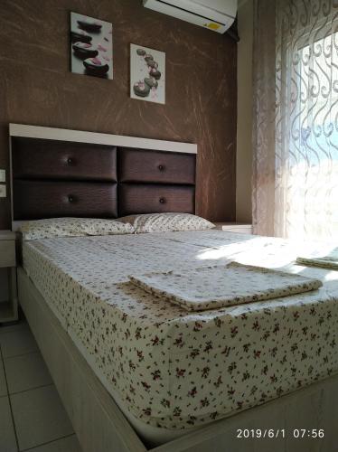 Posteľ alebo postele v izbe v ubytovaní LAZAROS APARTMENTS