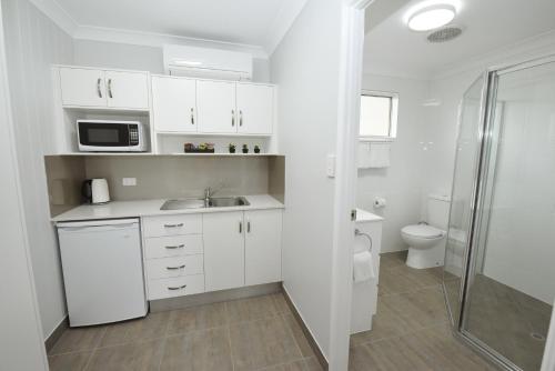 Koupelna v ubytování Raintree Motel Biloela