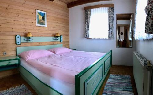 Postel nebo postele na pokoji v ubytování Appartements Futtertrögl