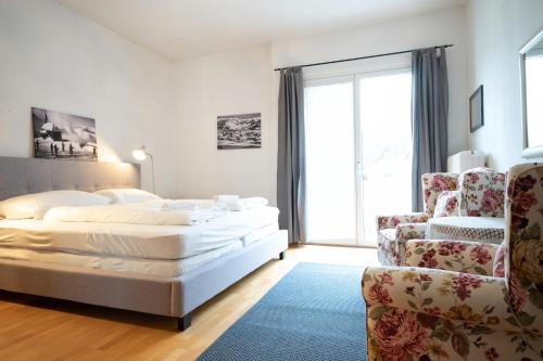 Postel nebo postele na pokoji v ubytování Living Eden by we rent, SUMMERCARD INCLUDED