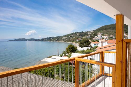 a balcony with a view of the water at Megali Ammos House in Megali Ammos
