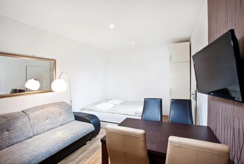 Postel nebo postele na pokoji v ubytování Apartments Kopečná with parking