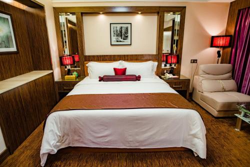 Postel nebo postele na pokoji v ubytování Nanyang King's Gate Hotel--Free Shuttle Service to Canton Fair