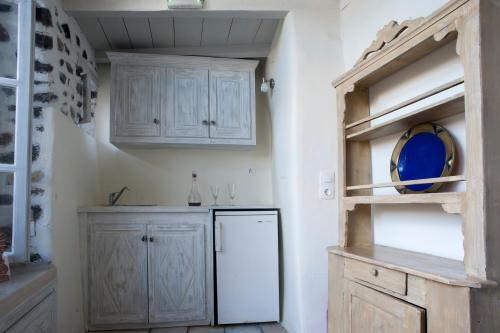 Kuchyň nebo kuchyňský kout v ubytování Heliophos Boutique Caves