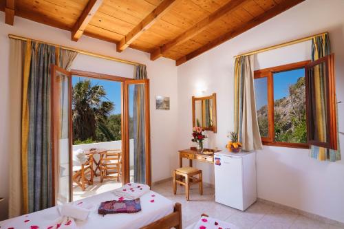 Posezení v ubytování Dionyssos Rooms Preveli Crete
