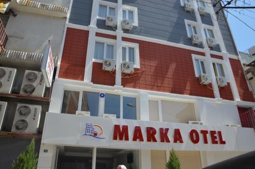 a maraka office sign in front of a building at Marka Hotel in Antalya