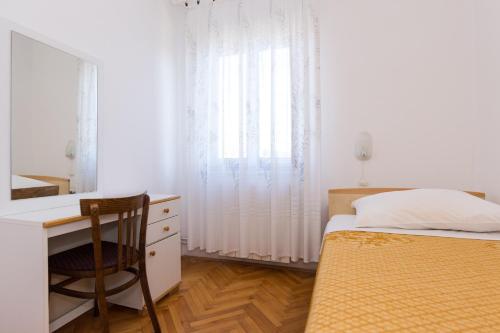 Posteľ alebo postele v izbe v ubytovaní Apartment Pavacic