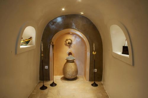 Fotografie z fotogalerie ubytování Heliophos Boutique Caves v destinaci Oia