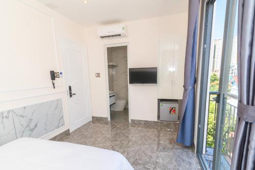 Televisyen dan/atau pusat hiburan di Sun Beach Hotel