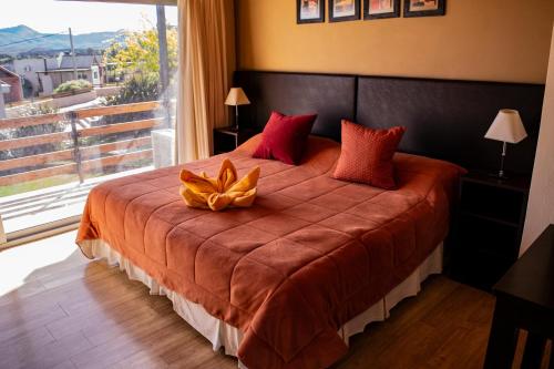 Ένα ή περισσότερα κρεβάτια σε δωμάτιο στο Posada y spa Las Golondrinas