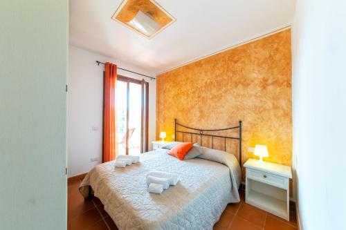 Ένα ή περισσότερα κρεβάτια σε δωμάτιο στο Residence Ataras