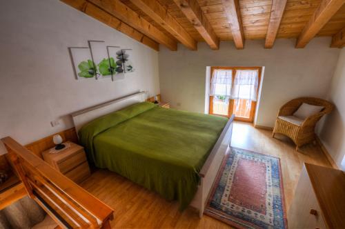 A bed or beds in a room at Casetta alla Corte
