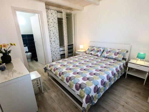 Ένα ή περισσότερα κρεβάτια σε δωμάτιο στο Villa Il Sole