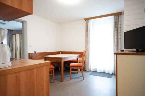 Televízia a/alebo spoločenská miestnosť v ubytovaní Seilergasse Apartments by we rent, SUMMERCARD INCLUDED