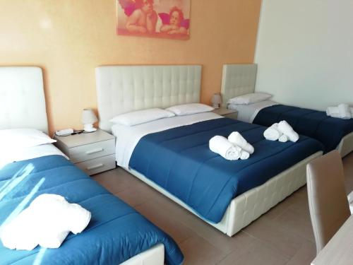Postel nebo postele na pokoji v ubytování b&b MareSalento
