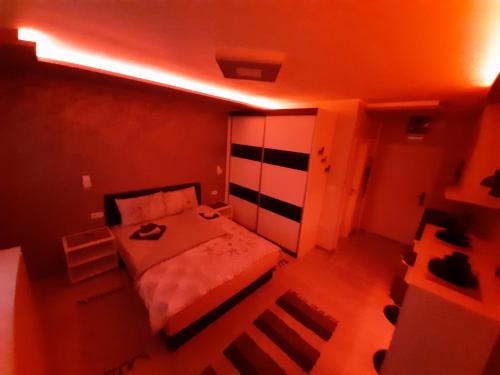 a small room with a bed in a room at Victoria in Vračar (historical)