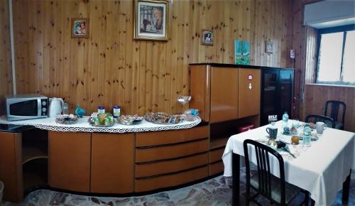 Reštaurácia alebo iné gastronomické zariadenie v ubytovaní Malpensa Bed & Breakfast