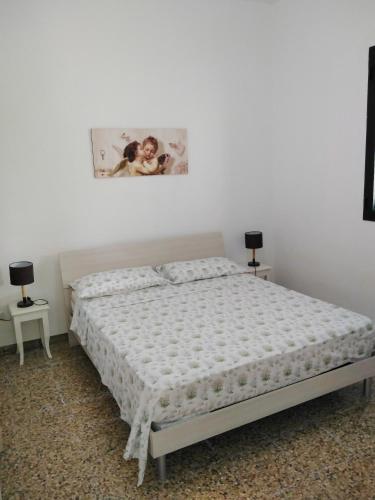 Postel nebo postele na pokoji v ubytování Villa Rollo