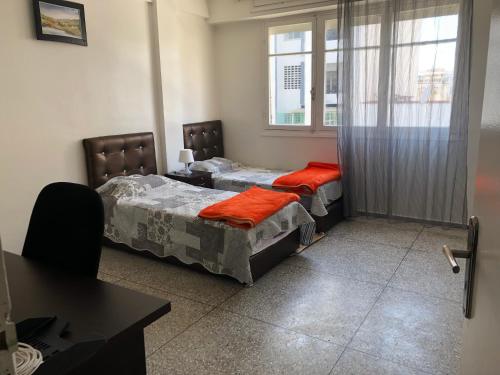 Familly Apartement Agdal Rabat centreにあるベッド