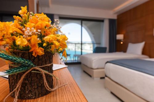 Katil atau katil-katil dalam bilik di INFINITY BY YELKEN AQUAPARK&RESORTS KUŞADASI