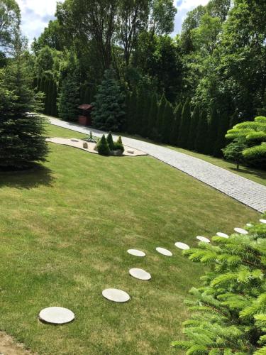 a group of frisbees on the grass in a garden at Agroturystyka Krajno - Zagórze in Krajno-Zagórze