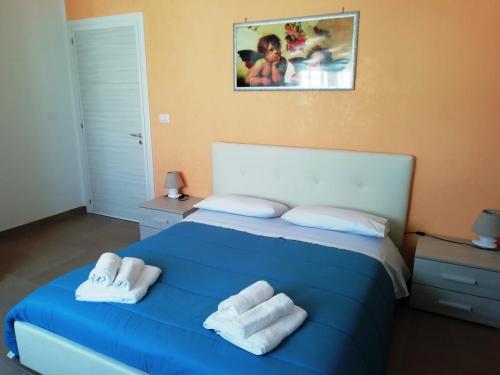 Postel nebo postele na pokoji v ubytování b&b MareSalento