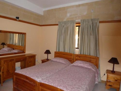 Кровать или кровати в номере San Antonio Guesthouse