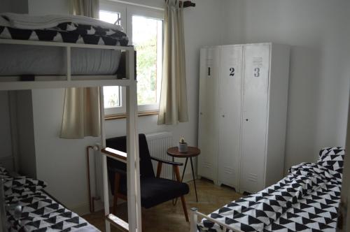 Cama o camas de una habitación en Mystic River Design Hostel