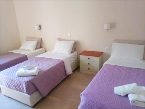 Katil atau katil-katil dalam bilik di Gorgona apartments & studios
