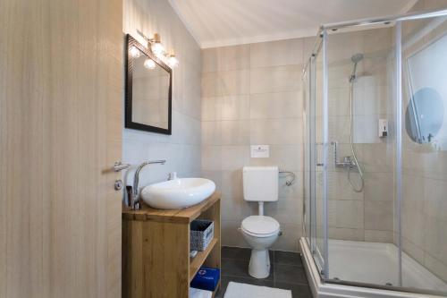 Kúpeľňa v ubytovaní Apartmani Mursa