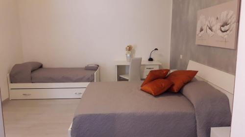 Una cama o camas en una habitación de B & B 2 eRRe