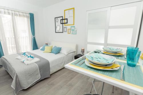 Ένα ή περισσότερα κρεβάτια σε δωμάτιο στο AMI apartments
