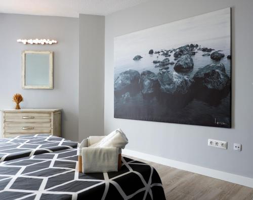 Ένα ή περισσότερα κρεβάτια σε δωμάτιο στο Mesa del Mar Sunset Dream vacational rental home