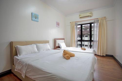 Katil atau katil-katil dalam bilik di Marina Court Kota Kinabalu-The Best Vacation Apartment