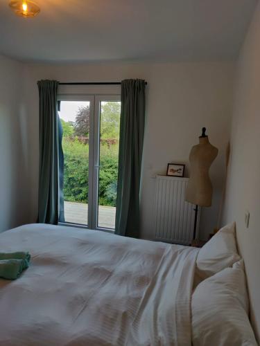 Säng eller sängar i ett rum på Wetterdelle Lodge
