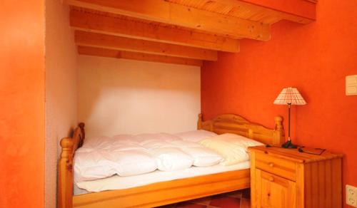 Postel nebo postele na pokoji v ubytování De Schwitzbamb