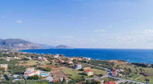 a small town on a hill near the ocean at Apartments Hotel & Studios, Xifoupolis in Monemvasia