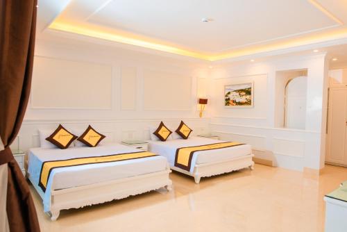 Ένα ή περισσότερα κρεβάτια σε δωμάτιο στο PARADISE HOTEL