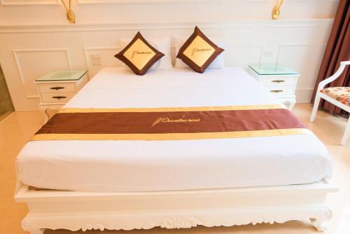 Ένα ή περισσότερα κρεβάτια σε δωμάτιο στο PARADISE HOTEL
