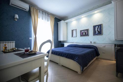 A bed or beds in a room at B&B Brindesi