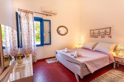 Кровать или кровати в номере Casa Maritina Traditional Family House