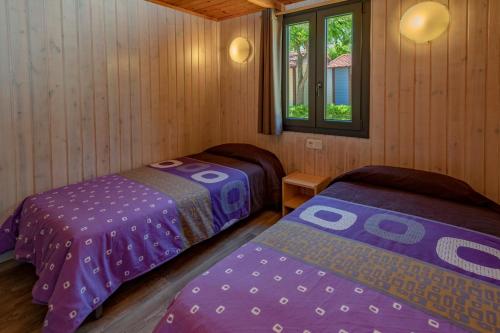Postel nebo postele na pokoji v ubytování Camping Solmar