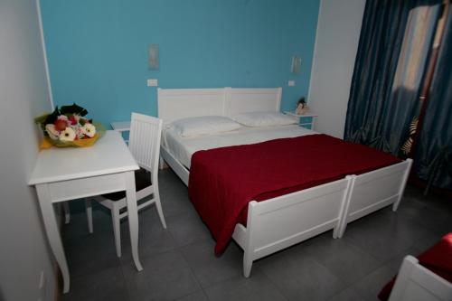 Cama o camas de una habitación en Bed & Breakfast Nettuno