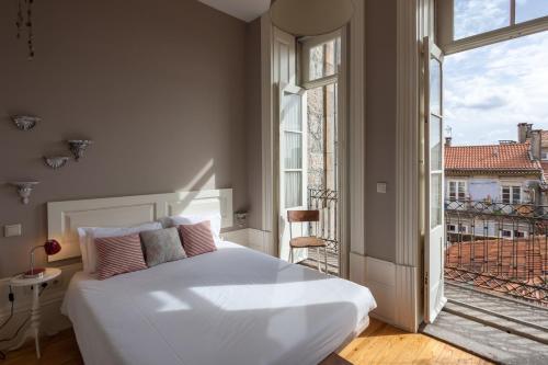 Cama o camas de una habitación en Being Porto Hostel