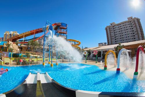 a large water park with a water slide at Boulevard Suíte Hotel by WAM Experience in Caldas Novas