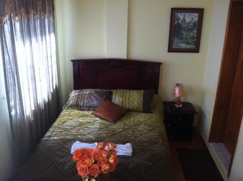 Hostal Jora Continentalにあるベッド