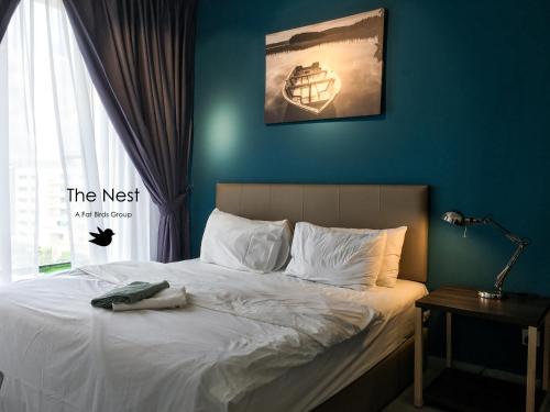 Ένα ή περισσότερα κρεβάτια σε δωμάτιο στο Cozy Kanvas Soho Suites