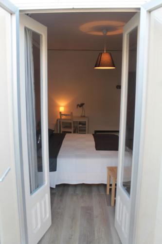 Postel nebo postele na pokoji v ubytování B&B Torre Castellina