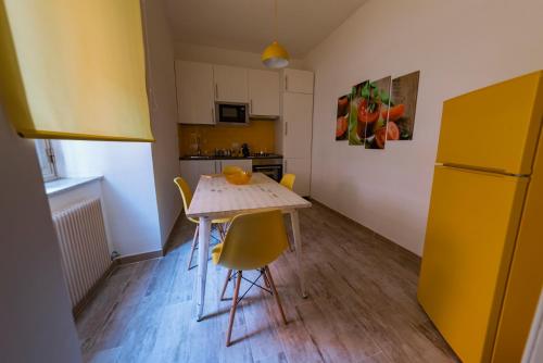 Kuchyň nebo kuchyňský kout v ubytování La casetta colorata